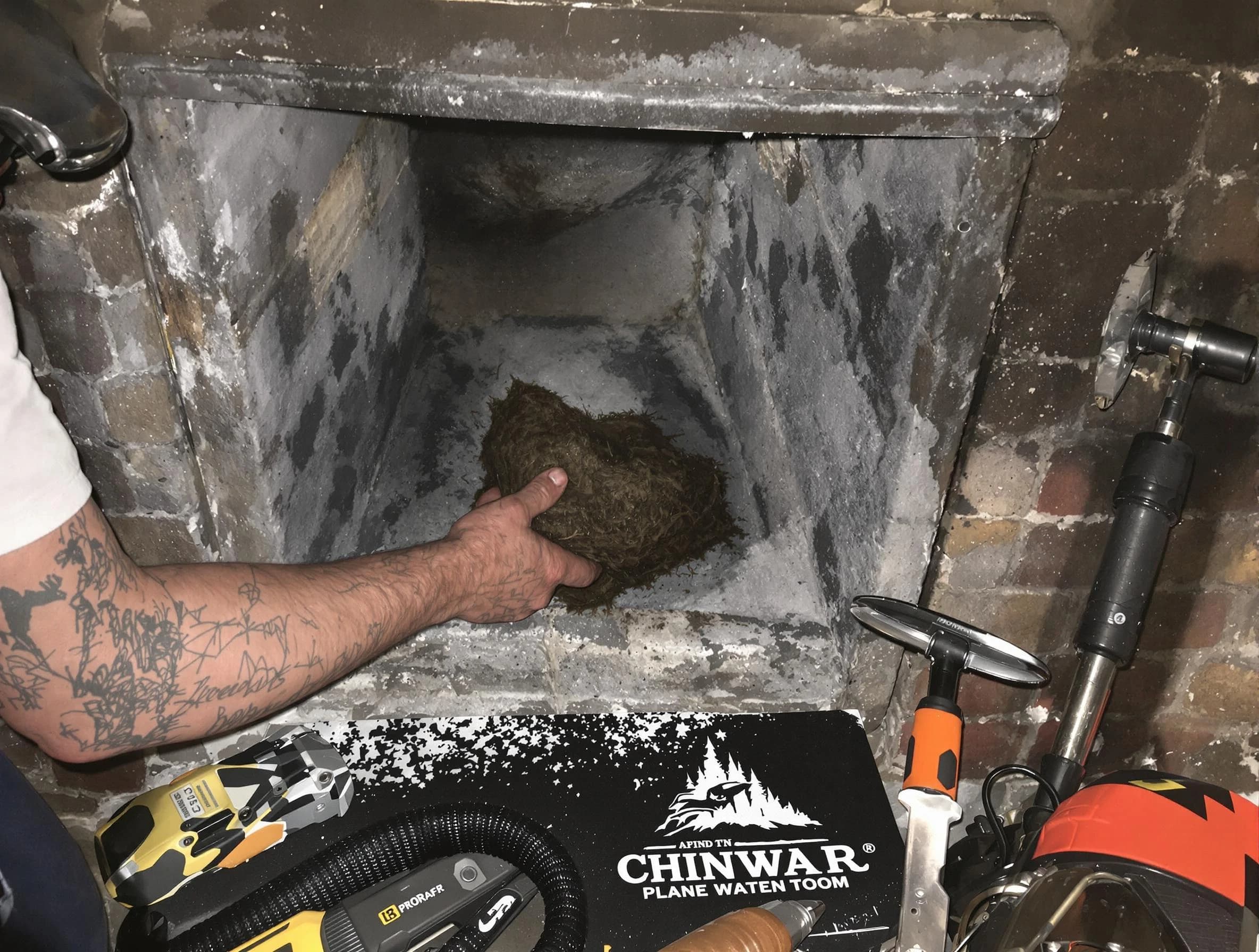 Bennett Chimney Sweep safely removing debris and screening chimney in Bennett, CO
